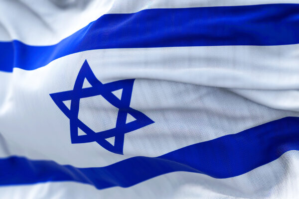 Close-up view of the Israel national flag waving in the wind